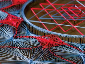 colourful thread woven together into patterns